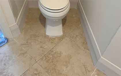 Four ceiling to floor windows with matching door installed in a double garage.