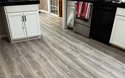 Installed white front door with glass insert.